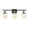 Beacon Bath Vanity Light shown in the Black Antique Brass finish with a Matte White shade