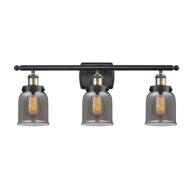 Bell Bath Vanity Light shown in the Black Antique Brass finish with a Plated Smoke shade