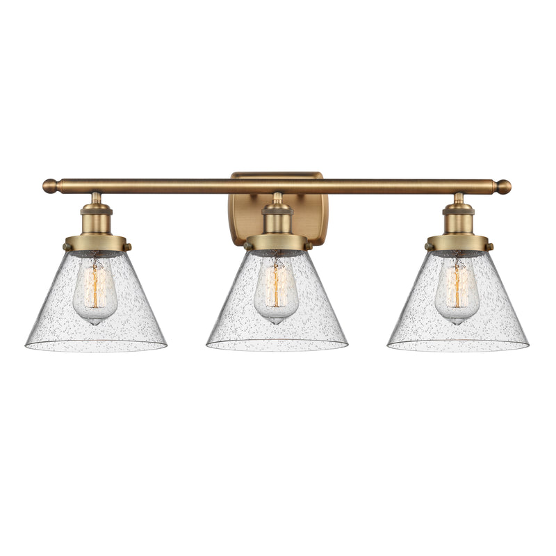 Cone Bath Vanity Light shown in the Brushed Brass finish with a Seedy shade