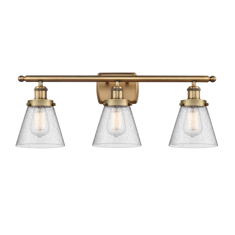 Cone Bath Vanity Light shown in the Brushed Brass finish with a Seedy shade