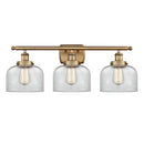 Bell Bath Vanity Light shown in the Brushed Brass finish with a Clear shade