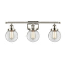 Beacon Bath Vanity Light shown in the Polished Nickel finish with a Clear shade