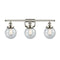 Beacon Bath Vanity Light shown in the Polished Nickel finish with a Seedy shade