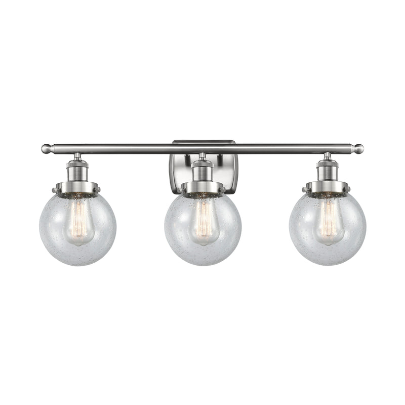 Beacon Bath Vanity Light shown in the Brushed Satin Nickel finish with a Seedy shade