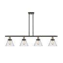 Cone Island Light shown in the Black Antique Brass finish with a Seedy shade