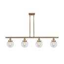 Beacon Island Light shown in the Brushed Brass finish with a Clear shade