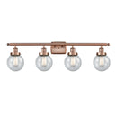 Beacon Bath Vanity Light shown in the Antique Copper finish with a Seedy shade