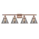 Cone Bath Vanity Light shown in the Antique Copper finish with a Plated Smoke shade