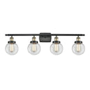 Beacon Bath Vanity Light shown in the Black Antique Brass finish with a Clear shade